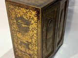 an image of a wooden cabinet with gold paint on it