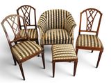 four chairs with striped upholstered upholstered cushions