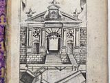 un vieux livre sur lequel est dessiné un bâtiment