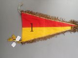 a red and yellow pennant with a number one on it