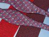 a pair of red and blue ties tied to each other