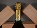 a bottle of champagne that is sitting on a table