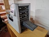 a machine that is sitting on top of a desk