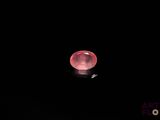 an image of a red ball in the dark