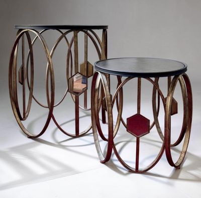 two tables that are sitting side by side on a white surface