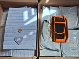 two boxes that have items inside of them in them
