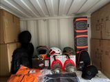 many boxes and bags in the back of a moving truck
