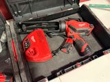 a tool in a tool box with a cordless drill