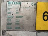 a sign on the side of a machine that says hitema