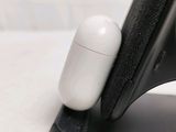 a close up of a cell phone with a mouse on top of it