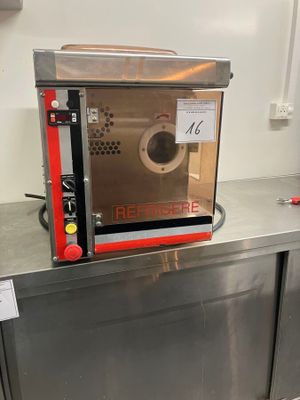 a microwave sitting on a counter in a kitchen