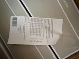 a receipt that is sitting on top of a box