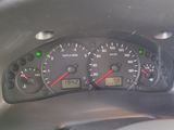 a close up of a speedometer in a car