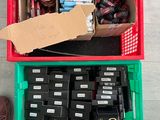 a box full of assorted items sitting on the floor
