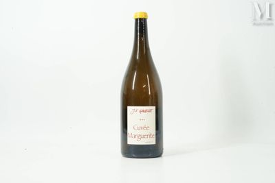 a bottle of wine that is sitting on a table
