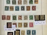 an open book with a bunch of stamps on it
