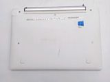 a white laptop with a blue sticker on it