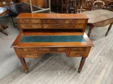 a small table with a drawer on top of it