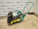 an image of a lawn mower sitting in a room