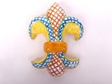a colorful fleur de lis decoration on the wall