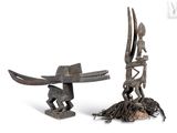two pieces of art that are sitting on top of a table