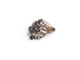 a close up of a ring on a white surface