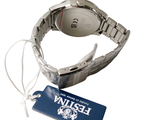 a wrist watch with a tag attached to it