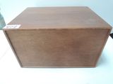 a wooden box that is sitting on a table