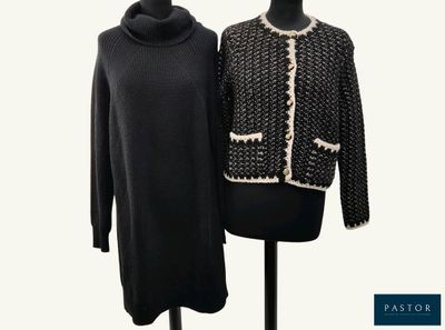 two black and white sweaters on a mannequin stand