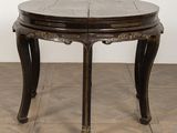 an image of a round table with a wooden top and two legs