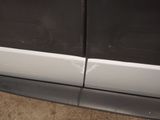 a close up of a door handle on a car