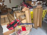 a pile of boxes and tools sitting on the floor