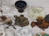 a table with a lot of glass items on it