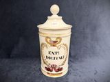 a canister with a lid that says exit deceita