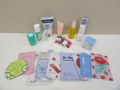 many different types of skin care products laid out on a table