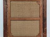 an old wooden picture frame with a burlock cloth backing