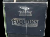 a black box with a silver and black logo on it
