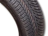 a close up of a tire on a white background