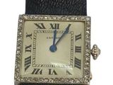an image of a wrist watch with roman numerals on it