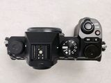 a camera that is sitting on a white surface