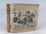 an old book with a picture of a car on it