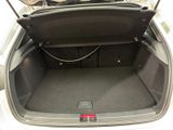 a trunk of a car with a bike in the back