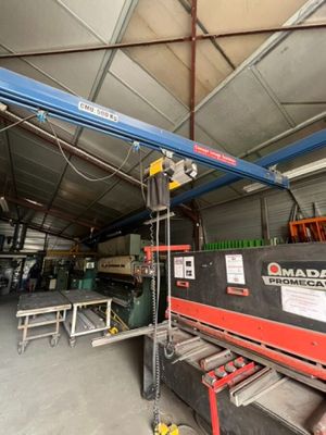 a large machine that is sitting inside of a building