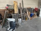 several pieces of wood are stacked on a cart in a garage