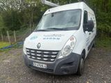 a white van that is parked on the side of the road