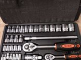 a tool kit in a case on a table
