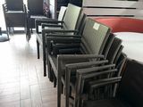 a lot of chairs that are lined up on the floor