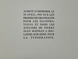 a black and white photo of a book with writing on it
