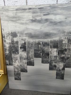 une photo d'un tableau posé par terre