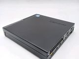 the back view of a laptop with a black cover on a white surface